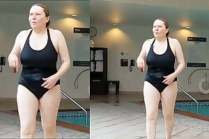 Sexy Grandma is Sexy at 66 in a black swimsuit